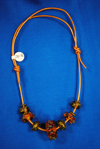 Necklace with Amber & Brown & Brass beads on leather - Joy Beadz Glass Jewelry
